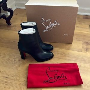 Christian Louboutin boots. Size 37. New!